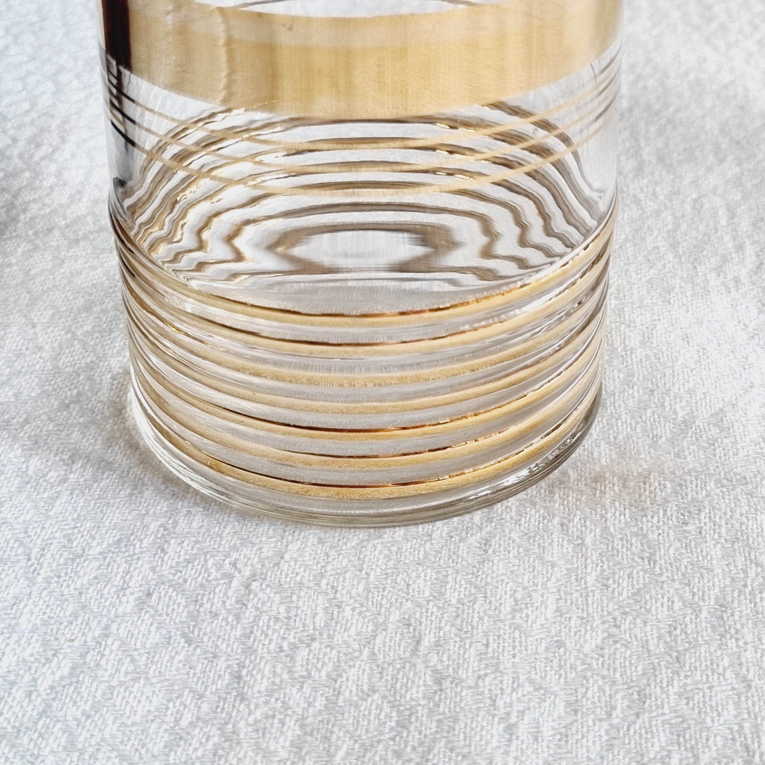 Blown glass decanter with golden borders
