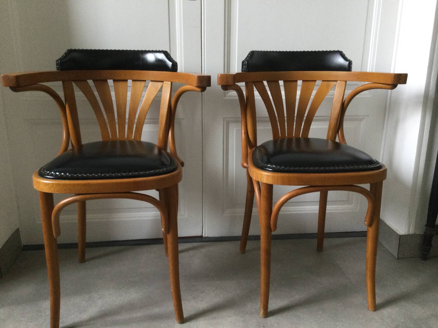 Pair of curved wooden bistro armchairs