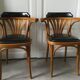 Pair of curved wooden bistro armchairs