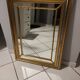 Mirror in gold and silver color