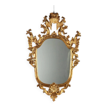 Antique carved and gilded wooden mirror, Italy, late 19th century.