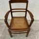 Cane armchair with armrests