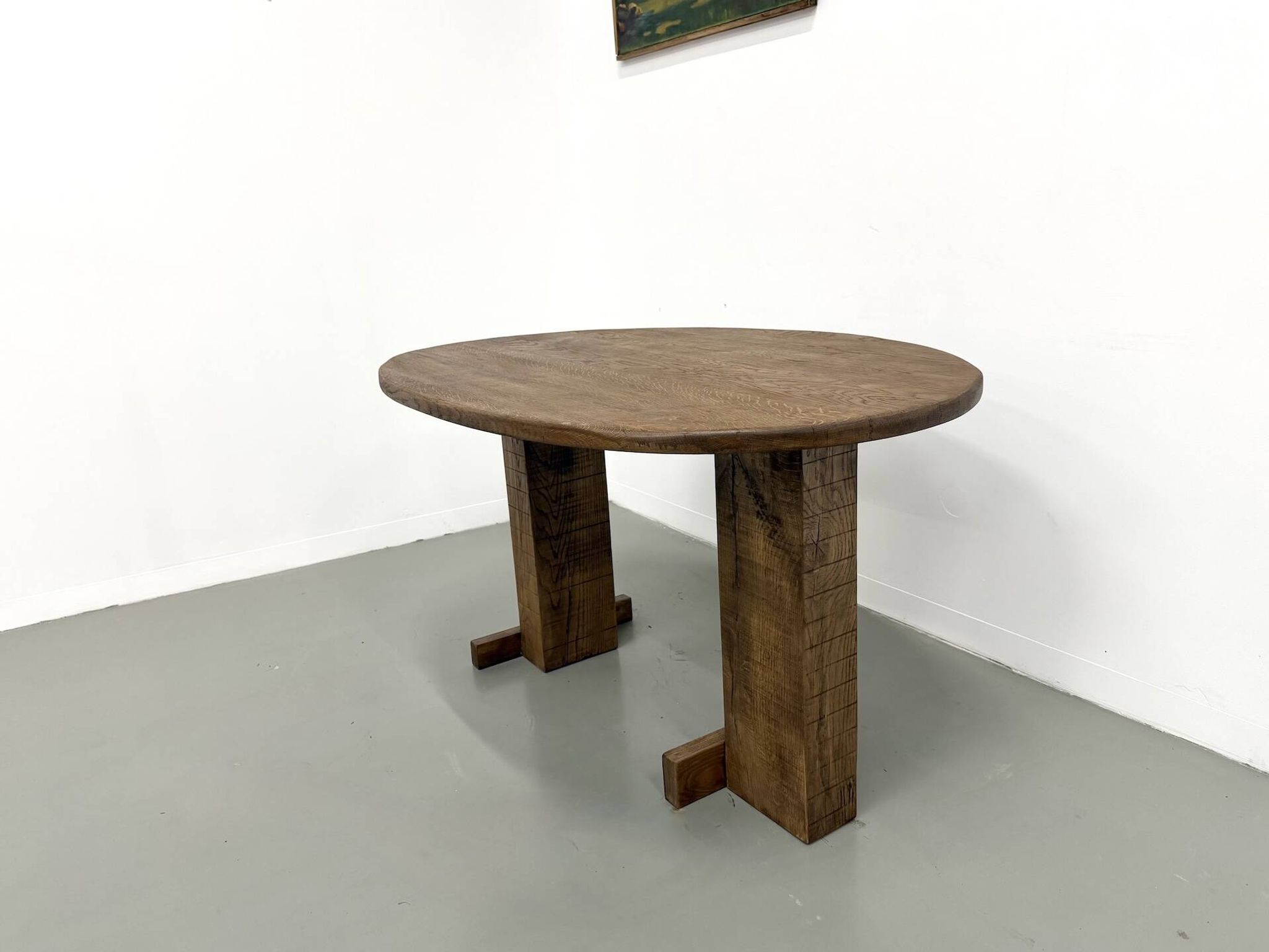 Oval table with T-shaped legs, solid oak, student woodworking project.