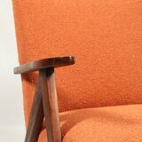 Vintage orange curly armchair Scandinavian design 1970