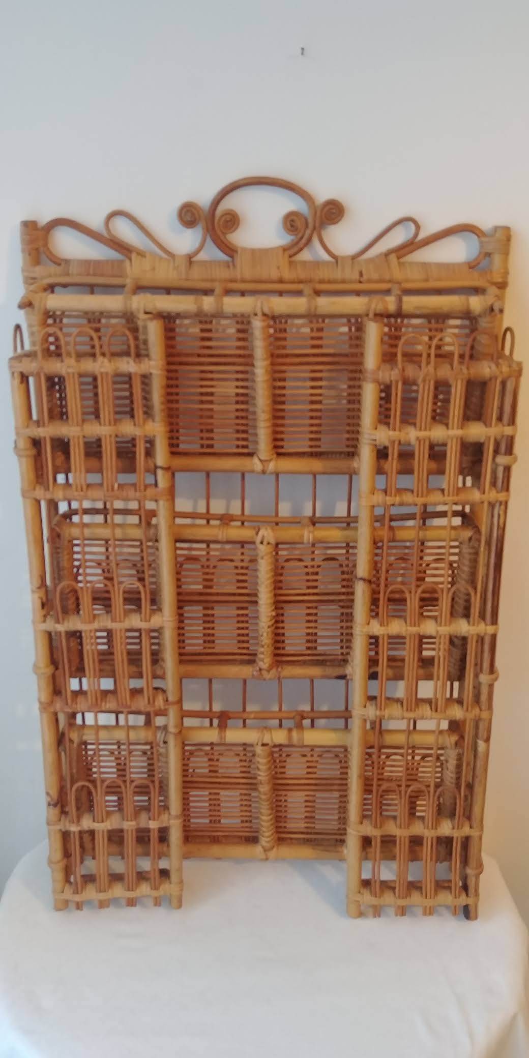 Rattan wall shelf