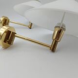 Pair of articulated arm wall lights in brass with opaline globe