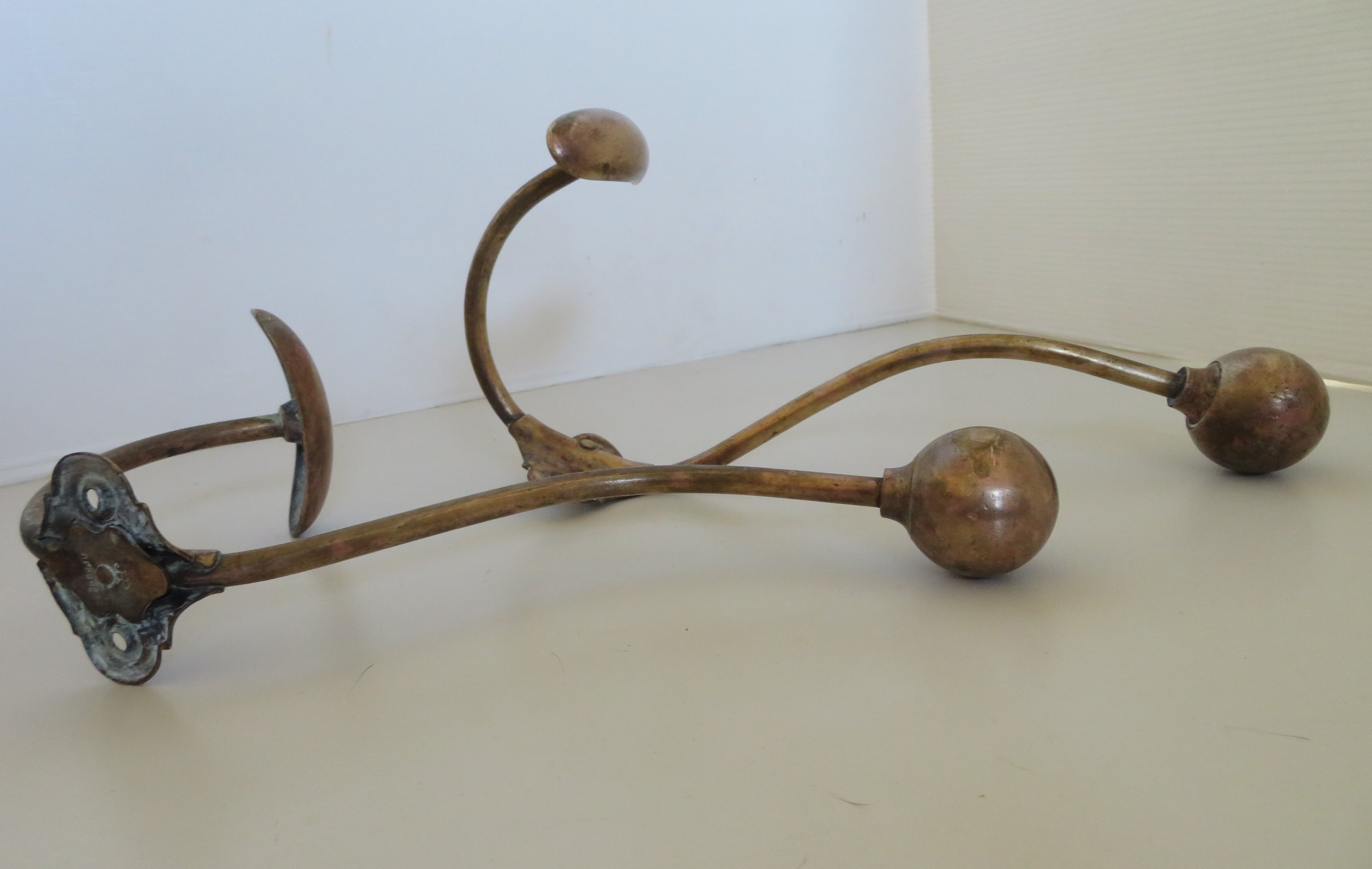 Pair of brass hooks