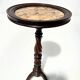 Napoleon III style gueridon in walnut and marble, 20th century.