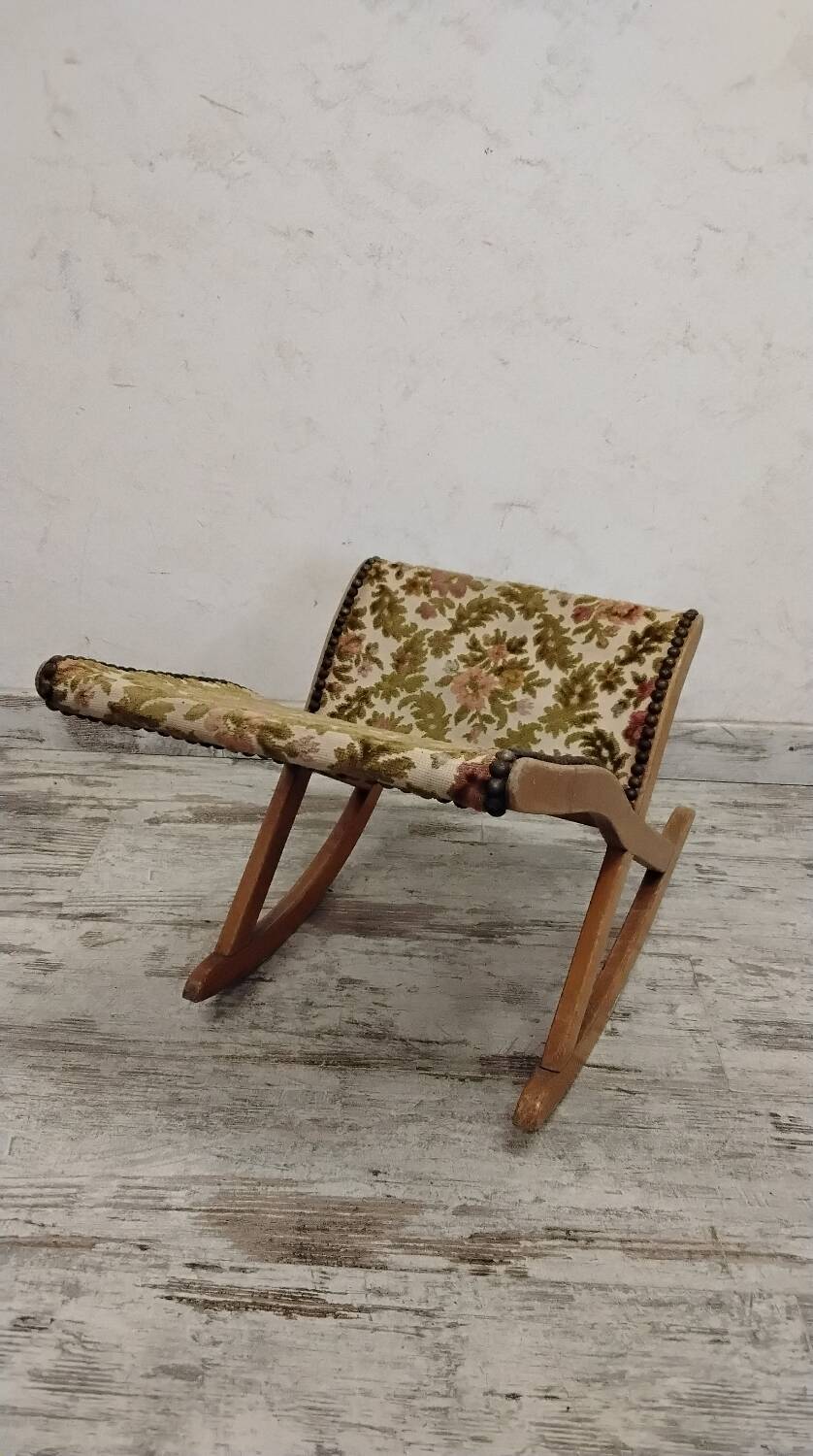 Antique rocking footrest