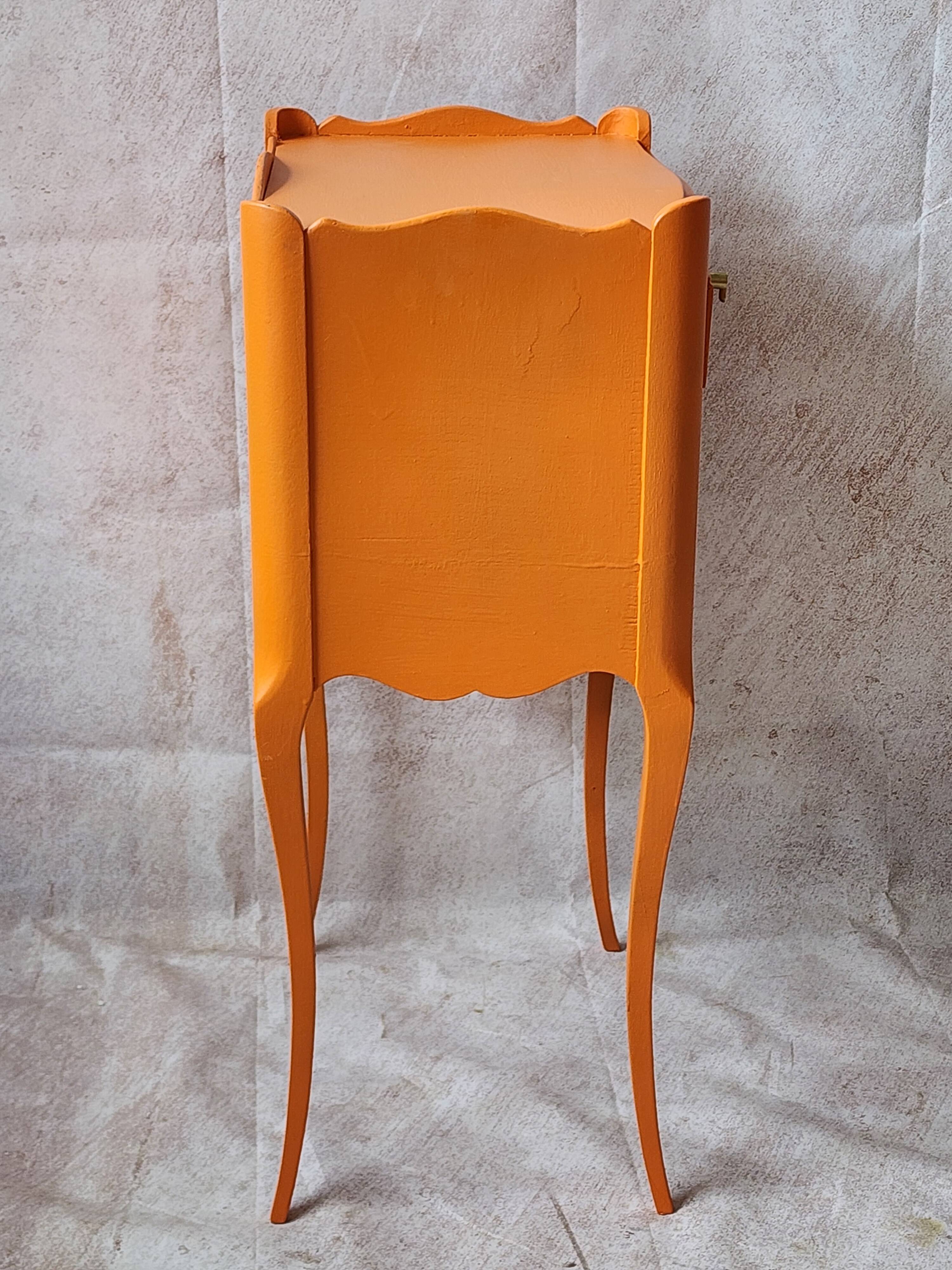 Old orange bedside table