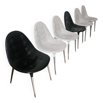 6 Cassina chairs, 4 white and 2 black.