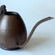 Old copper watering can with wooden handle, complete usuable, vintage from the 1960s