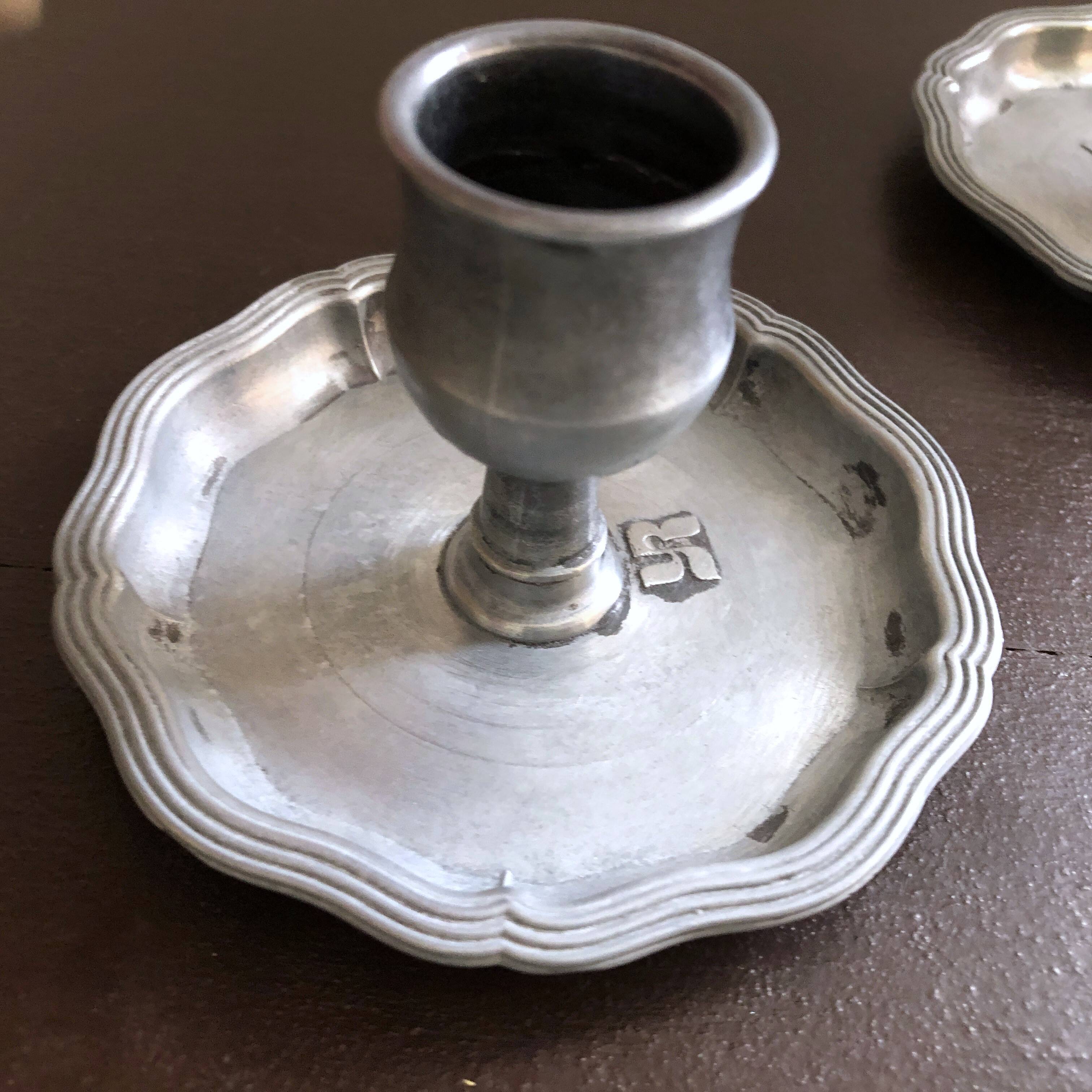 Pair of pewter table candlesticks