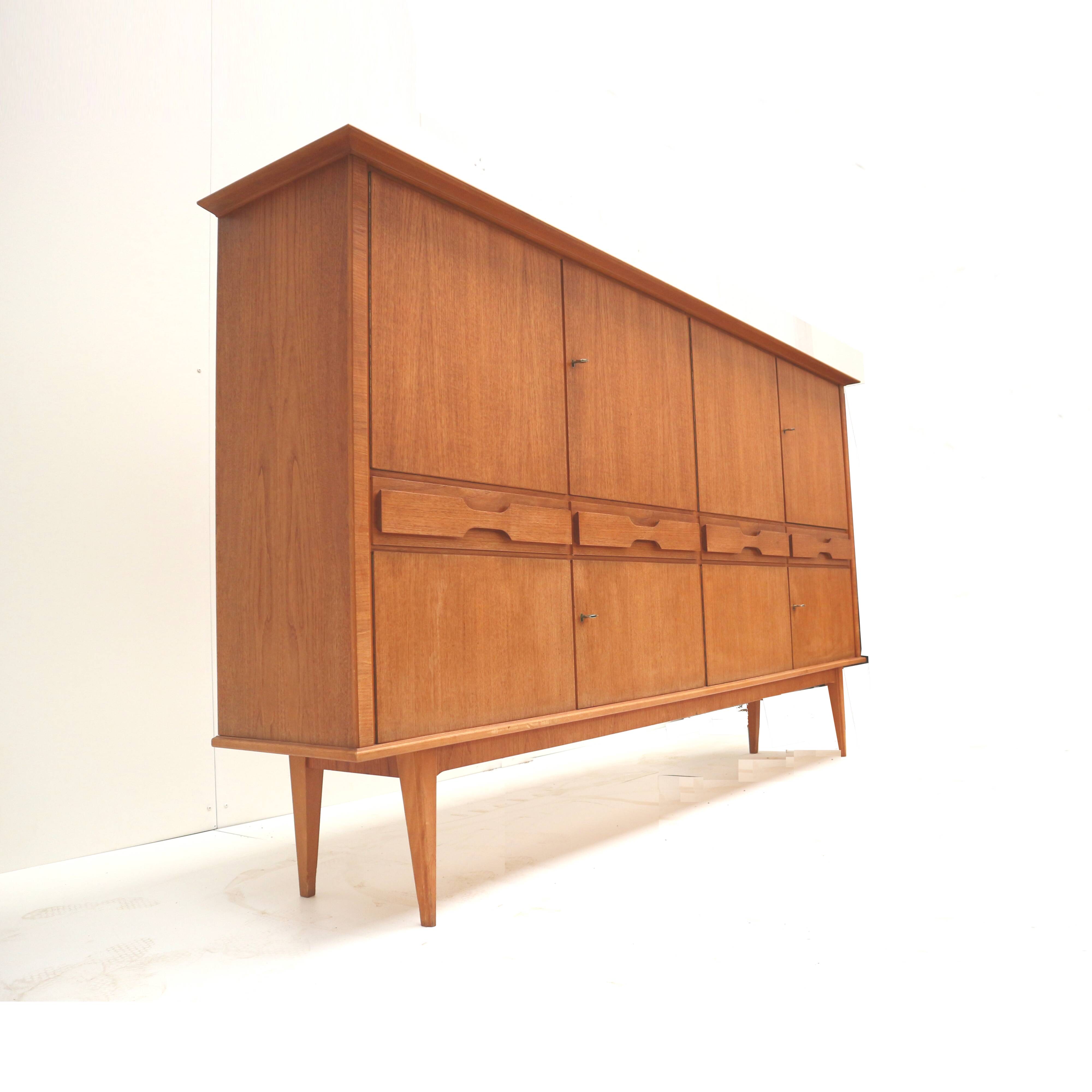 Large vintage teak highboard made in the 60s