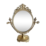Swivelling brass mirror
