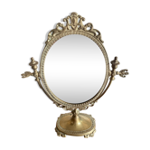 Swivelling brass mirror
