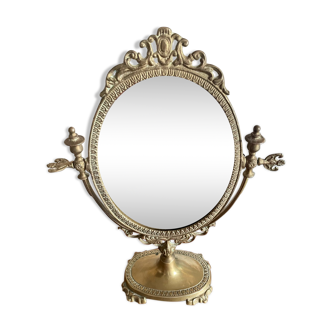 Swivelling brass mirror