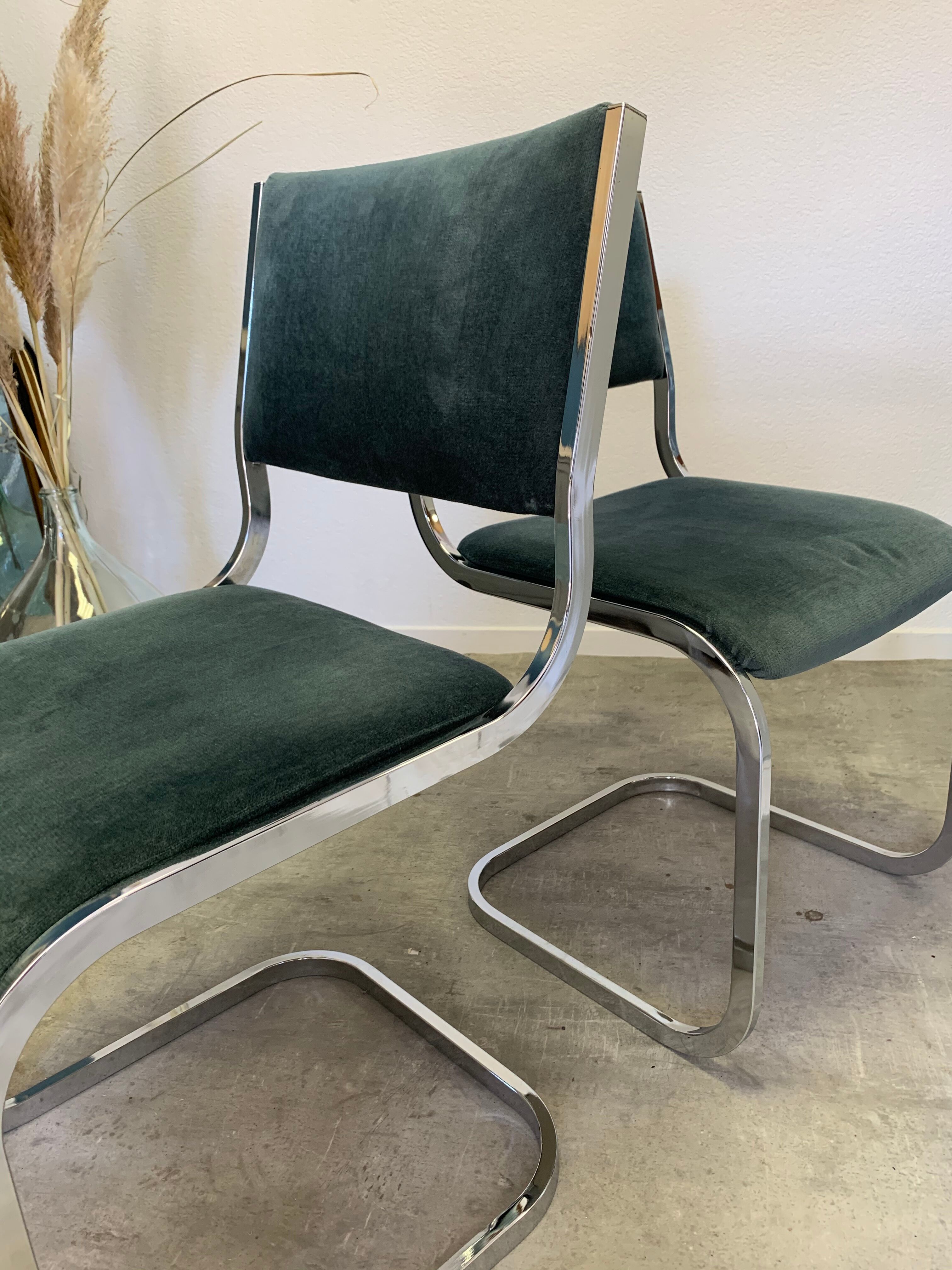 Pair of chrome blue chairs  70