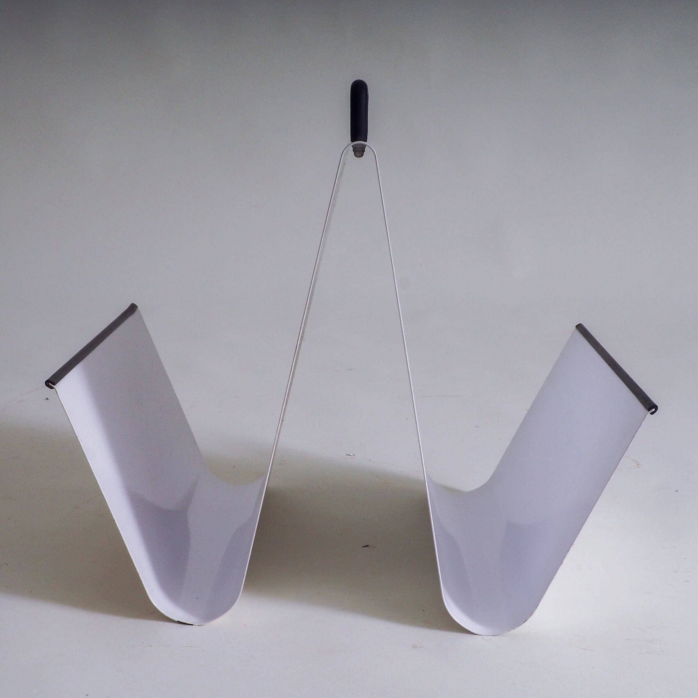 Metal magazine holder by Pete Sans for NRO