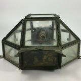 Metal and brass wall light with mirror background 1900