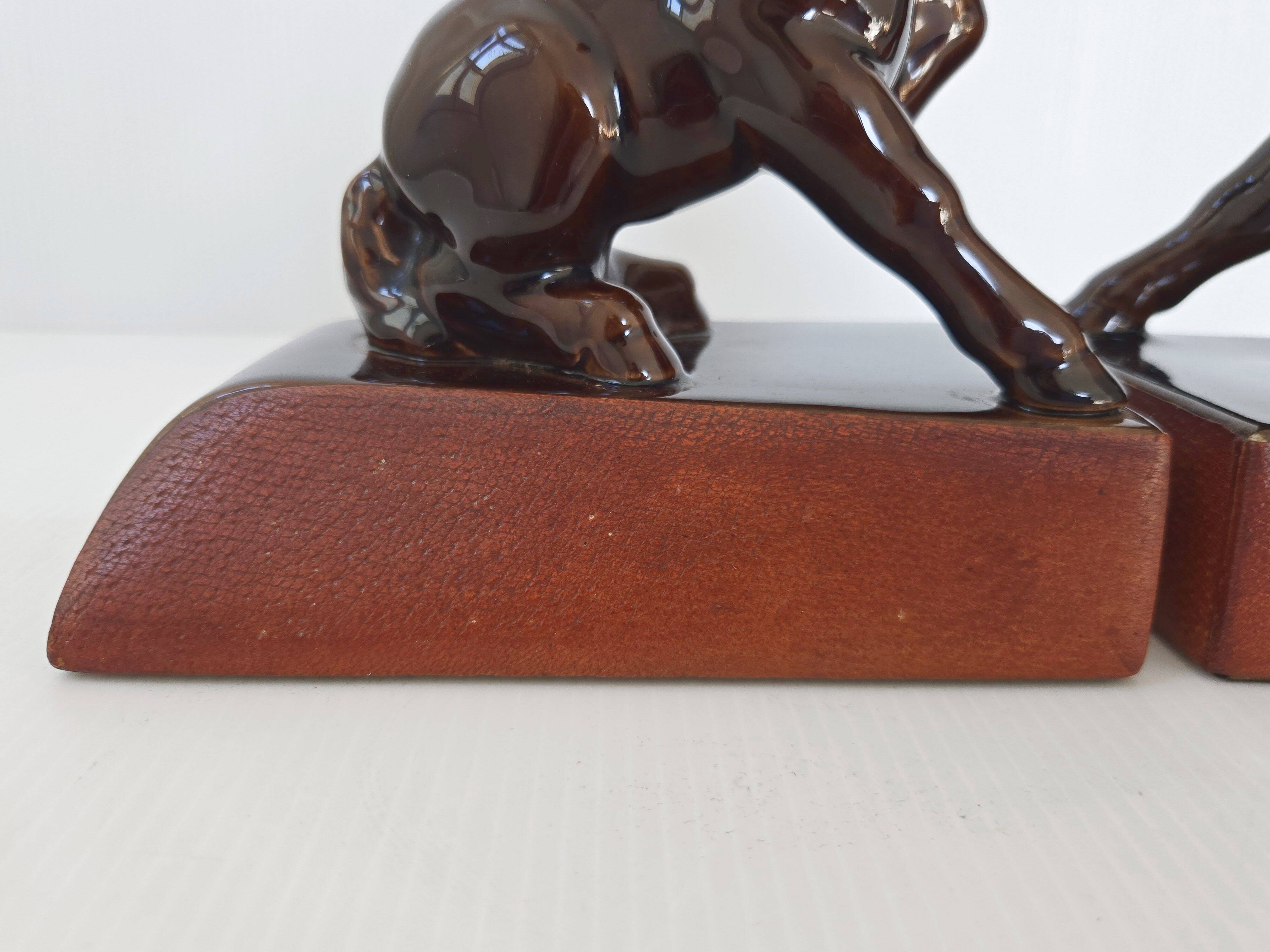 Pair of vintage leather & ceramic bookends