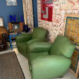 Pair of mustache club armcairs in green skai