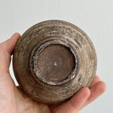Decorative vase in raw terracotta