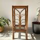 Vintage rattan plant stand in Art Deco style