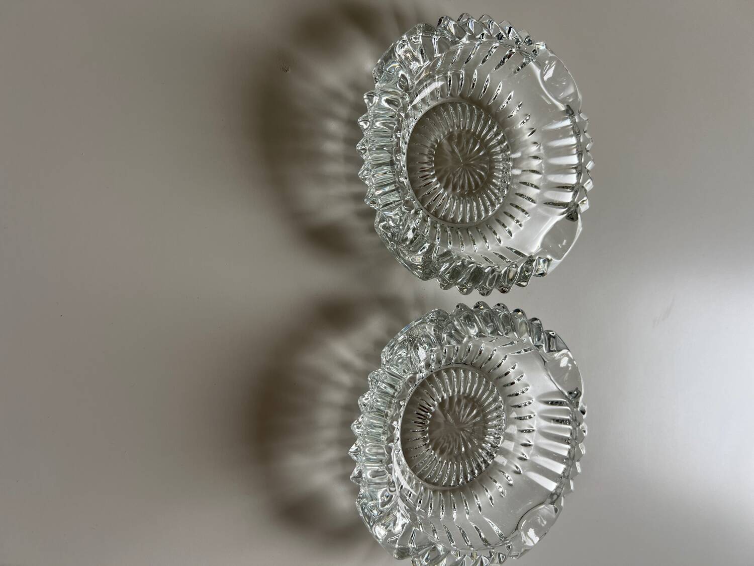 Two French crystal ashtrays