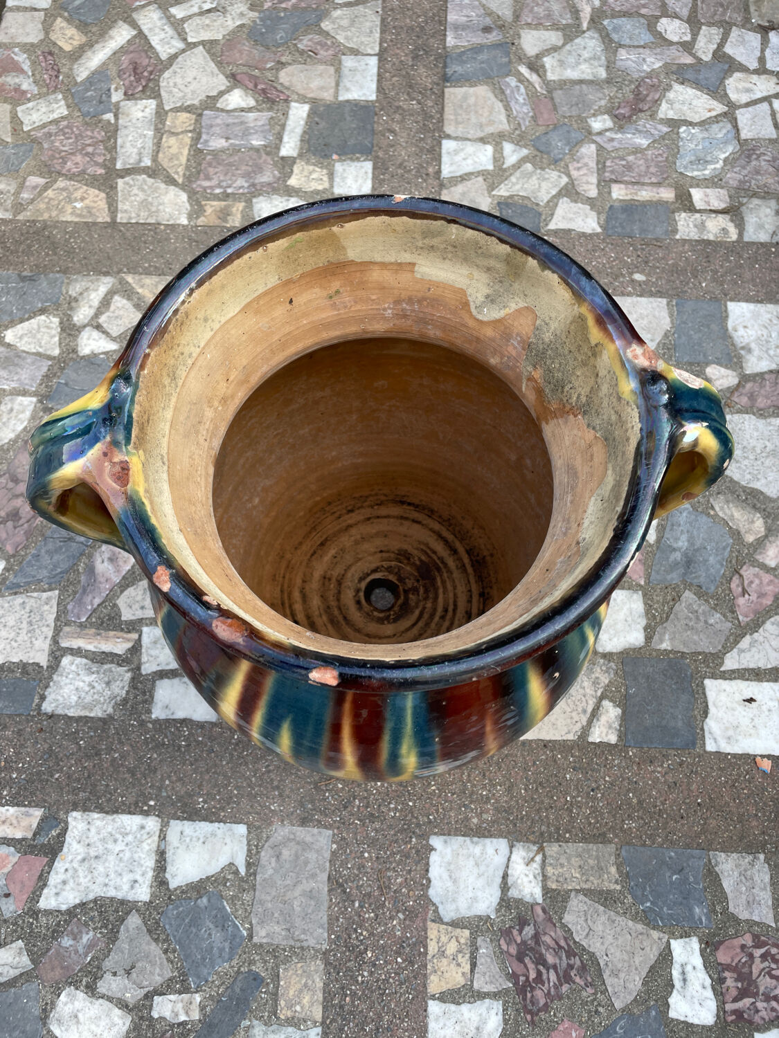 Old flower jar with two glazed earth handles