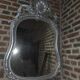 Louis xv style mirror with silver patinated shell