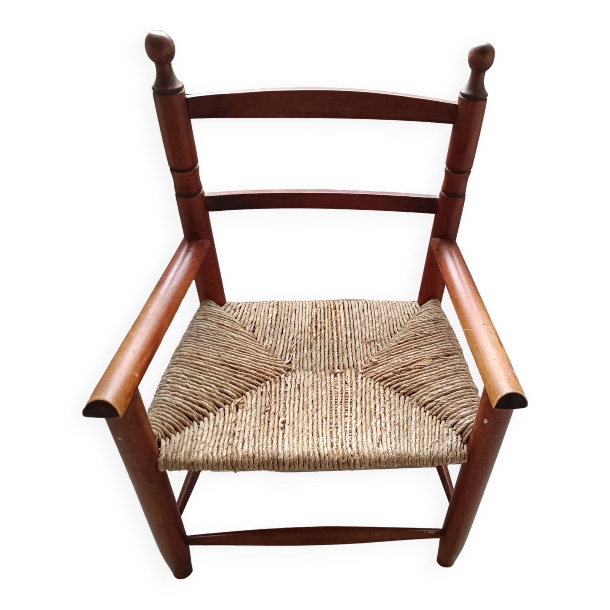 Children's wooden armchair and straw-covered seat.