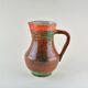 Accolay, pitcher with vibrant colors