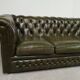Three-seater green leather Chesterfield sofa