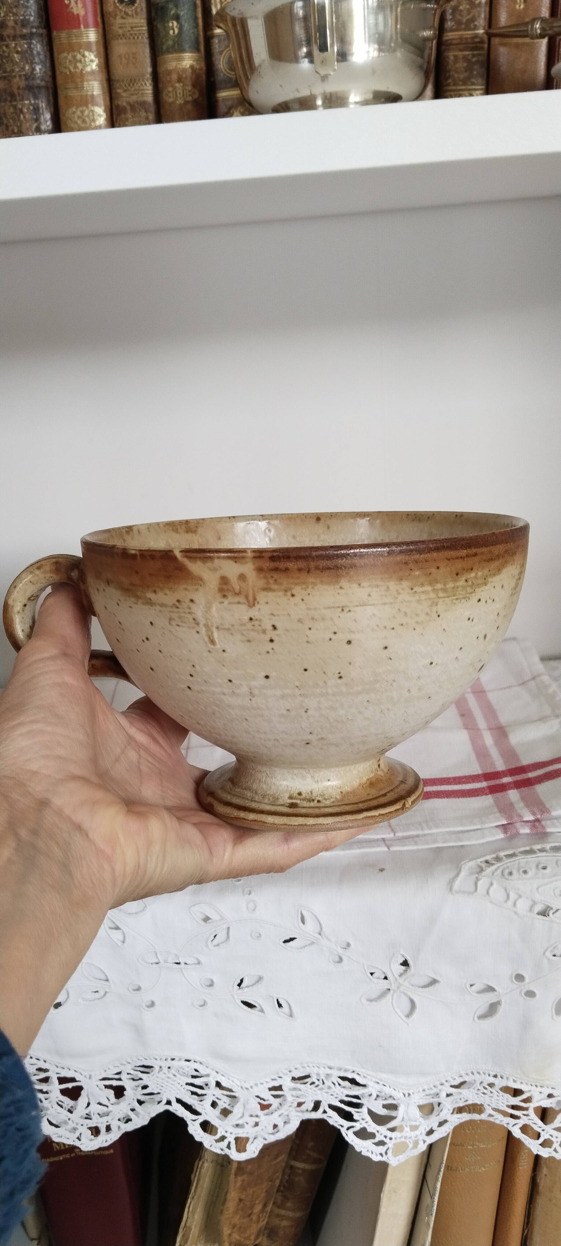 Large handmade stoneware bowl with foot