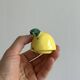 Yellow ceramic pear-shaped salt shaker