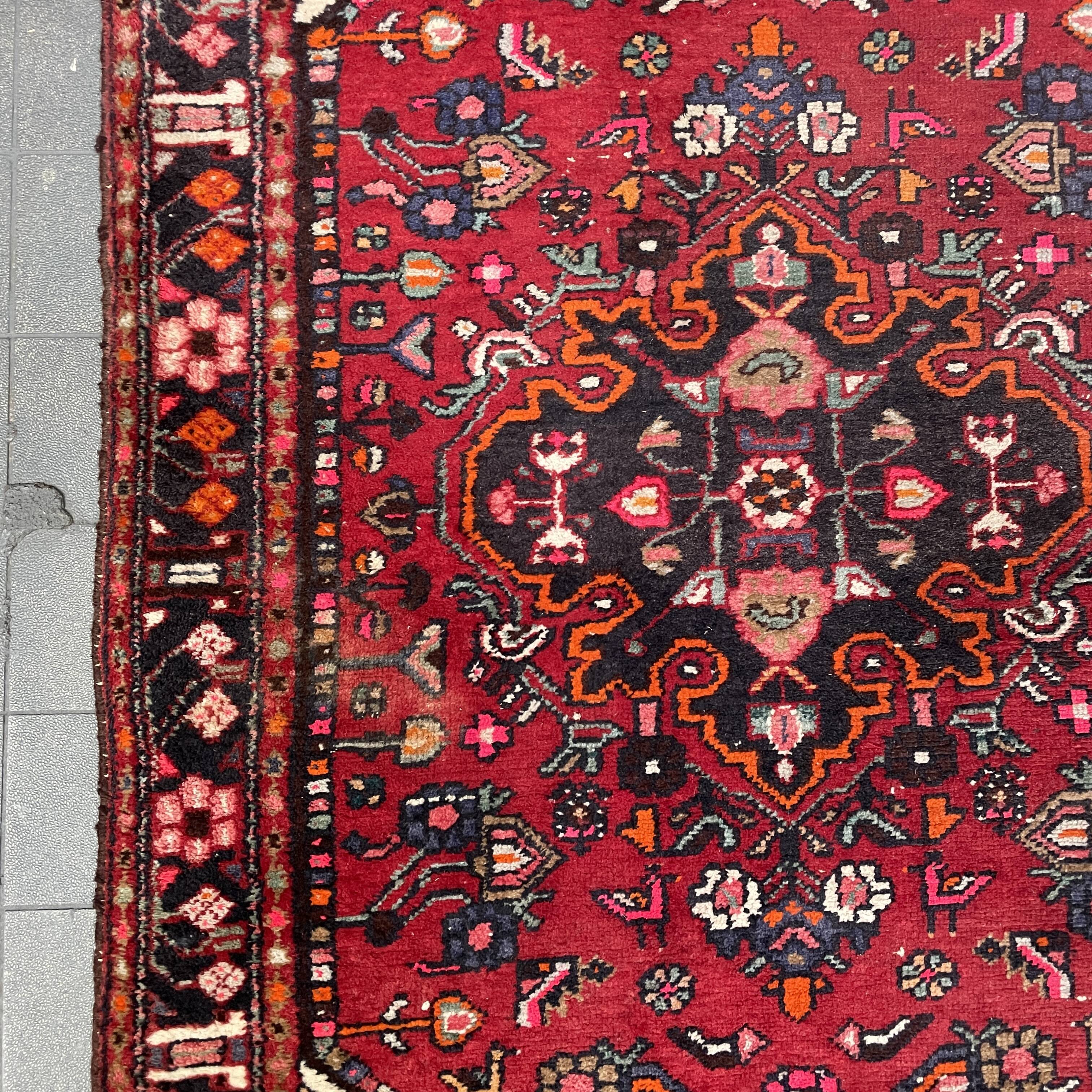Worn vintage oriental rug or carpet
