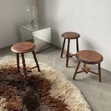Trio of old tripod stools