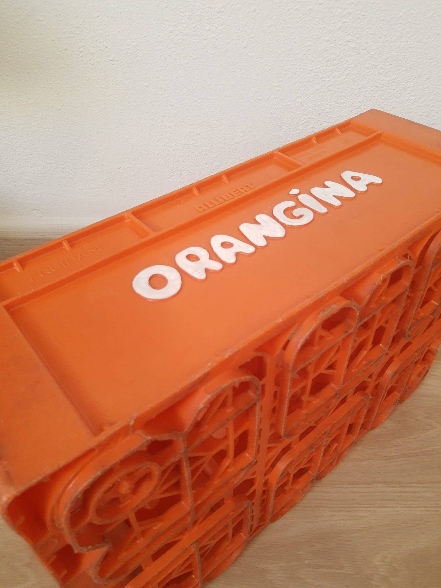 Vintage Orangina advertising bottle crate