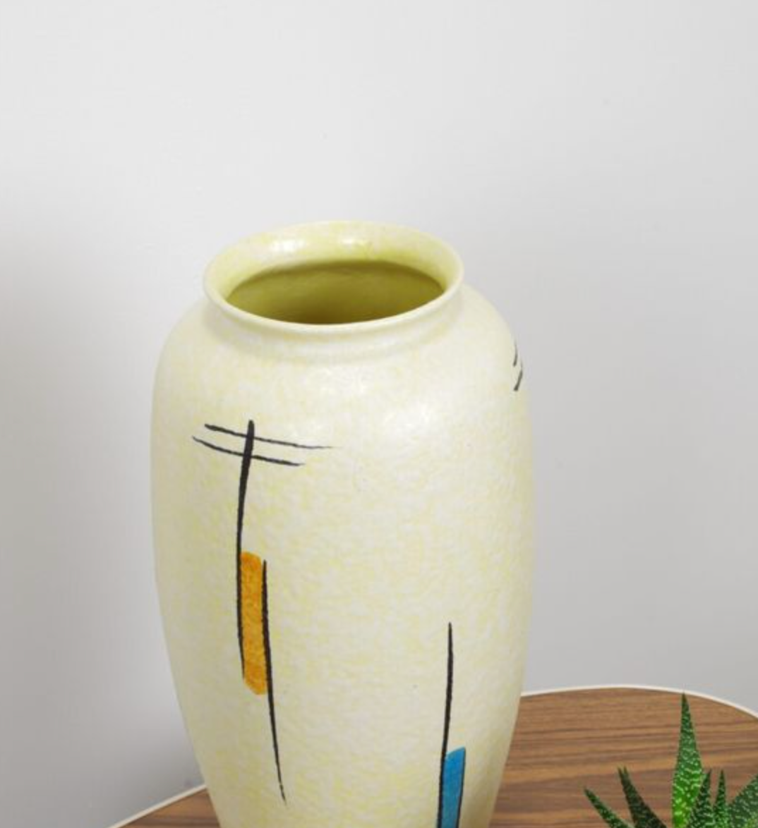 Vintage vase in light yellow porcelain