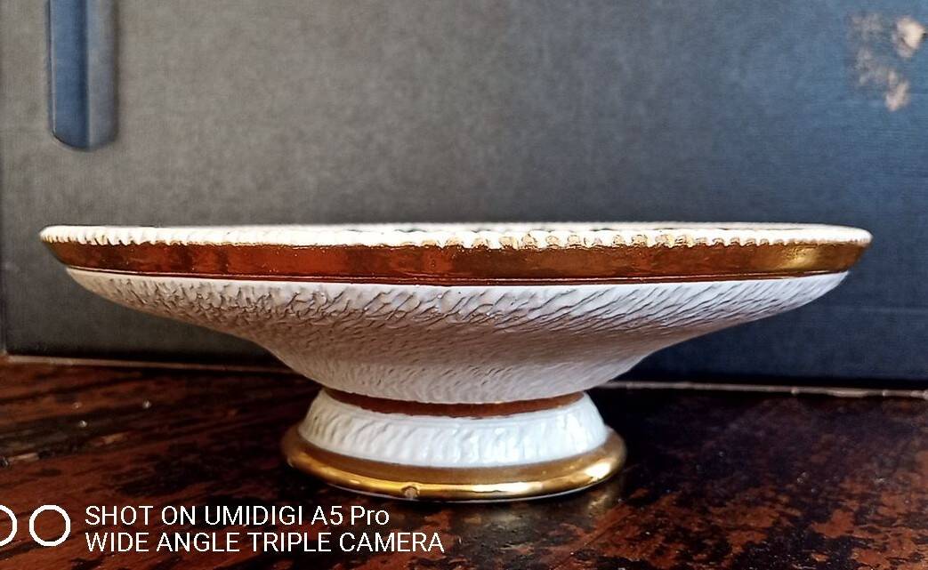 Earthenware fruit bowl - signed and numbered under the base