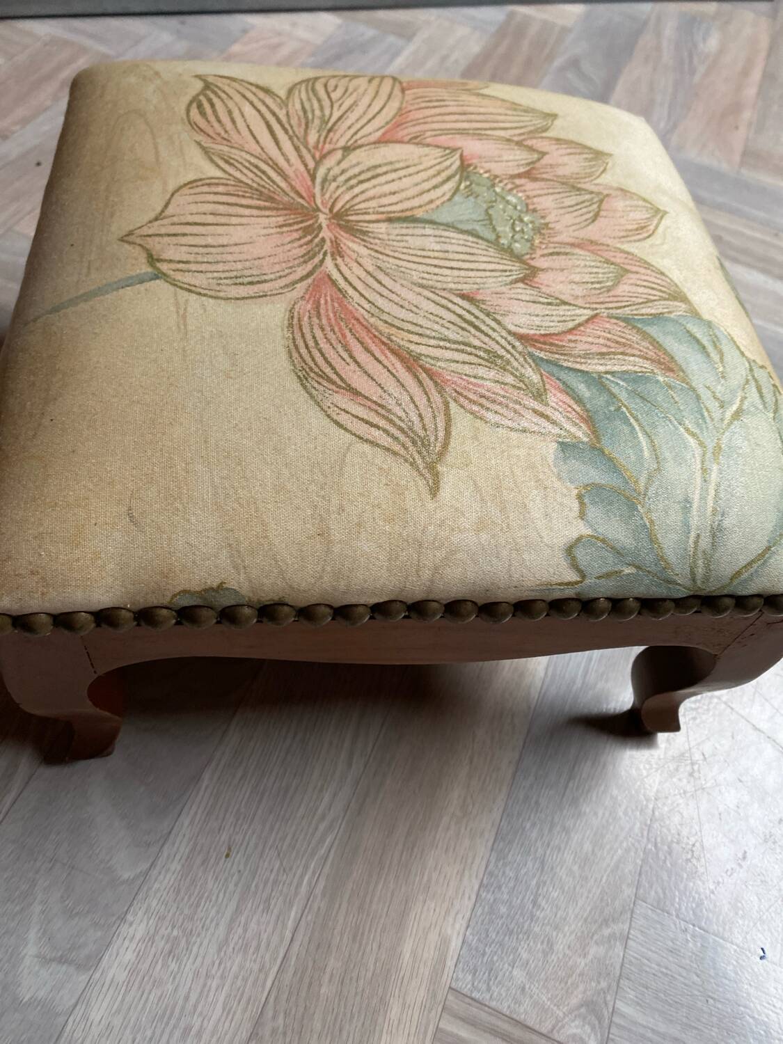 Vintage upholstered stool/footrest