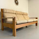 Three-seater canapé in solid oak with Scandinavian design fabric from the 1970s.