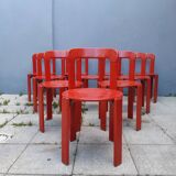 Set of 10 red wooden chairs by Bruno Rey for Kusch&Co