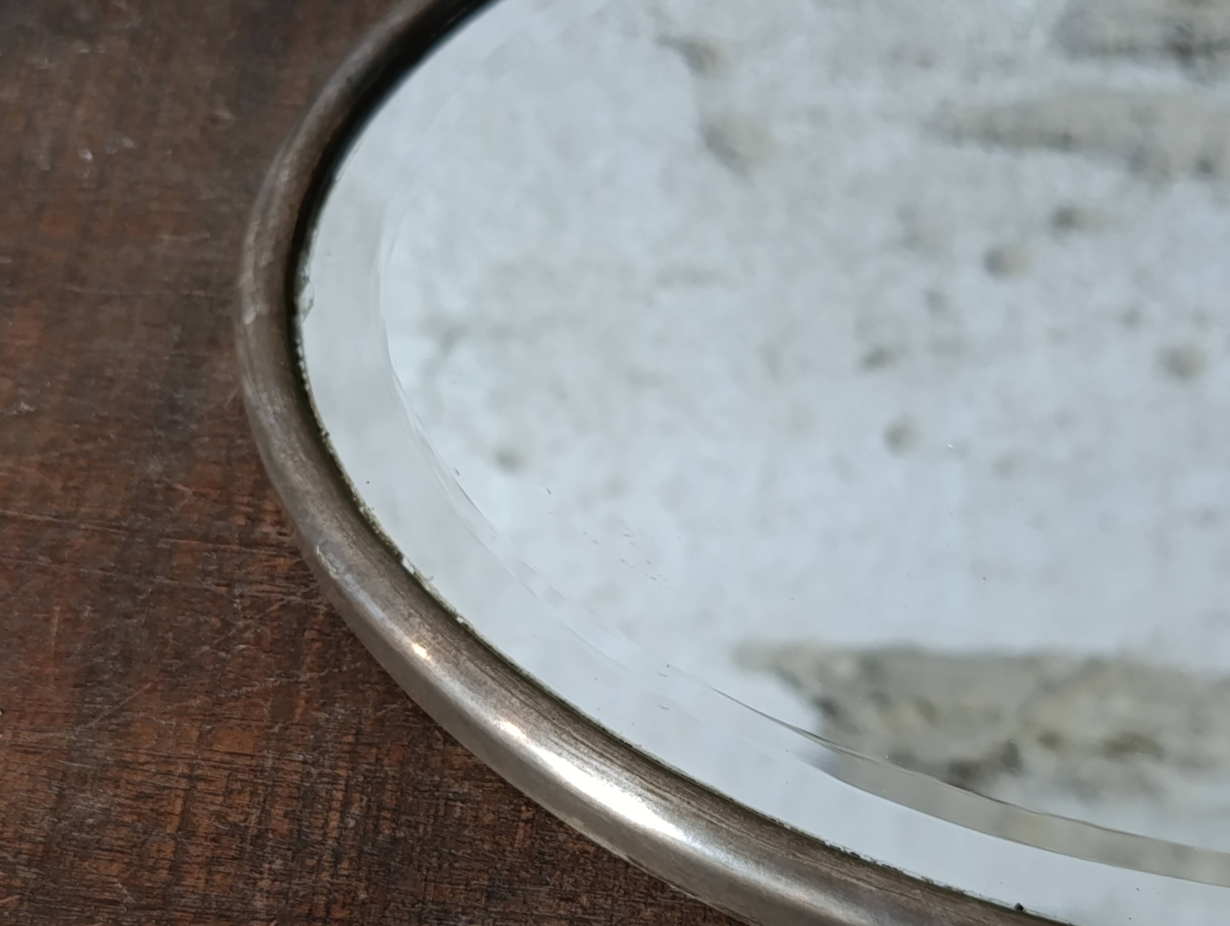 French vintage oval mirror with beveled glass and metal frame