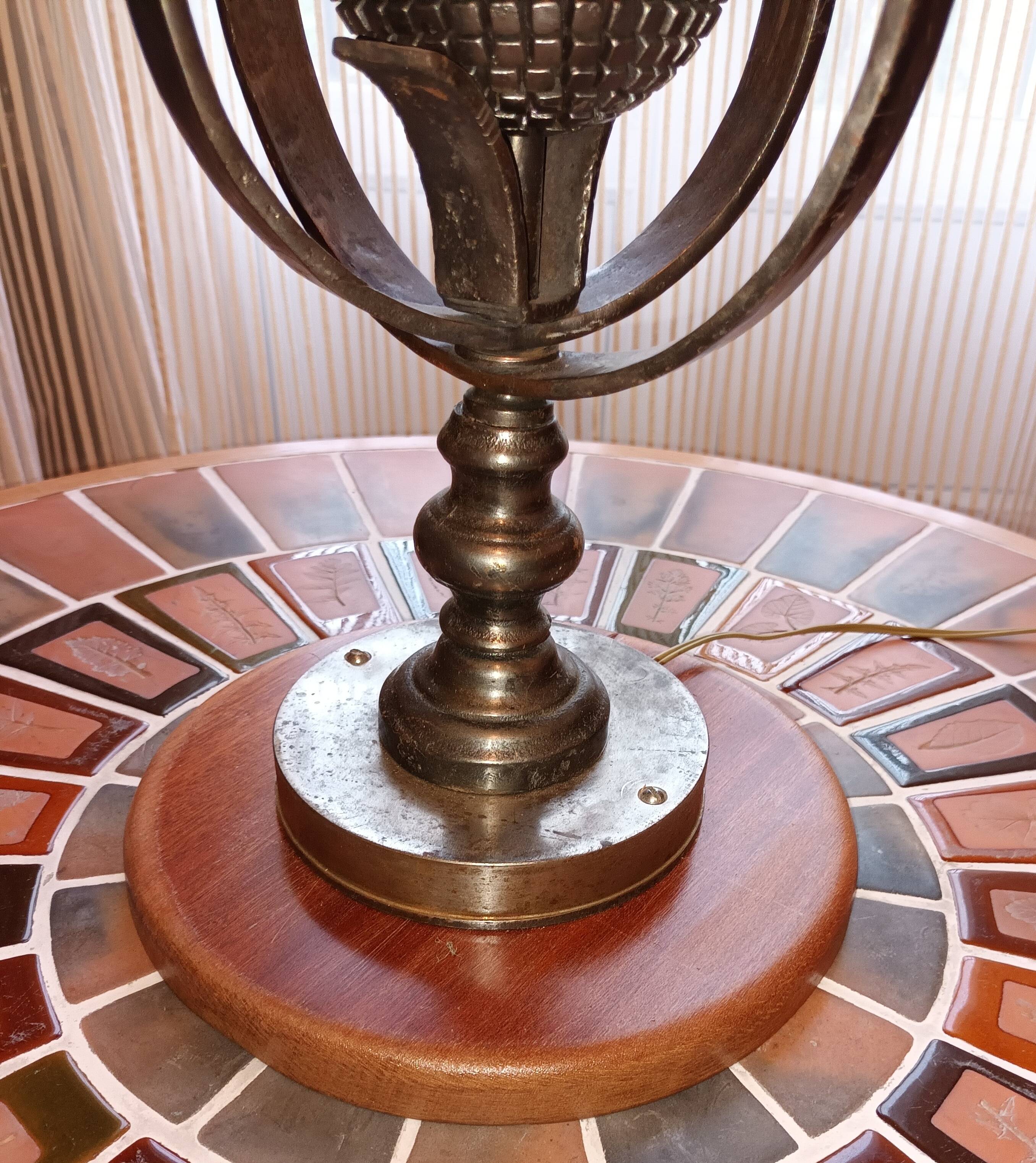 Wrought iron lamp with armillary sphere decorations
