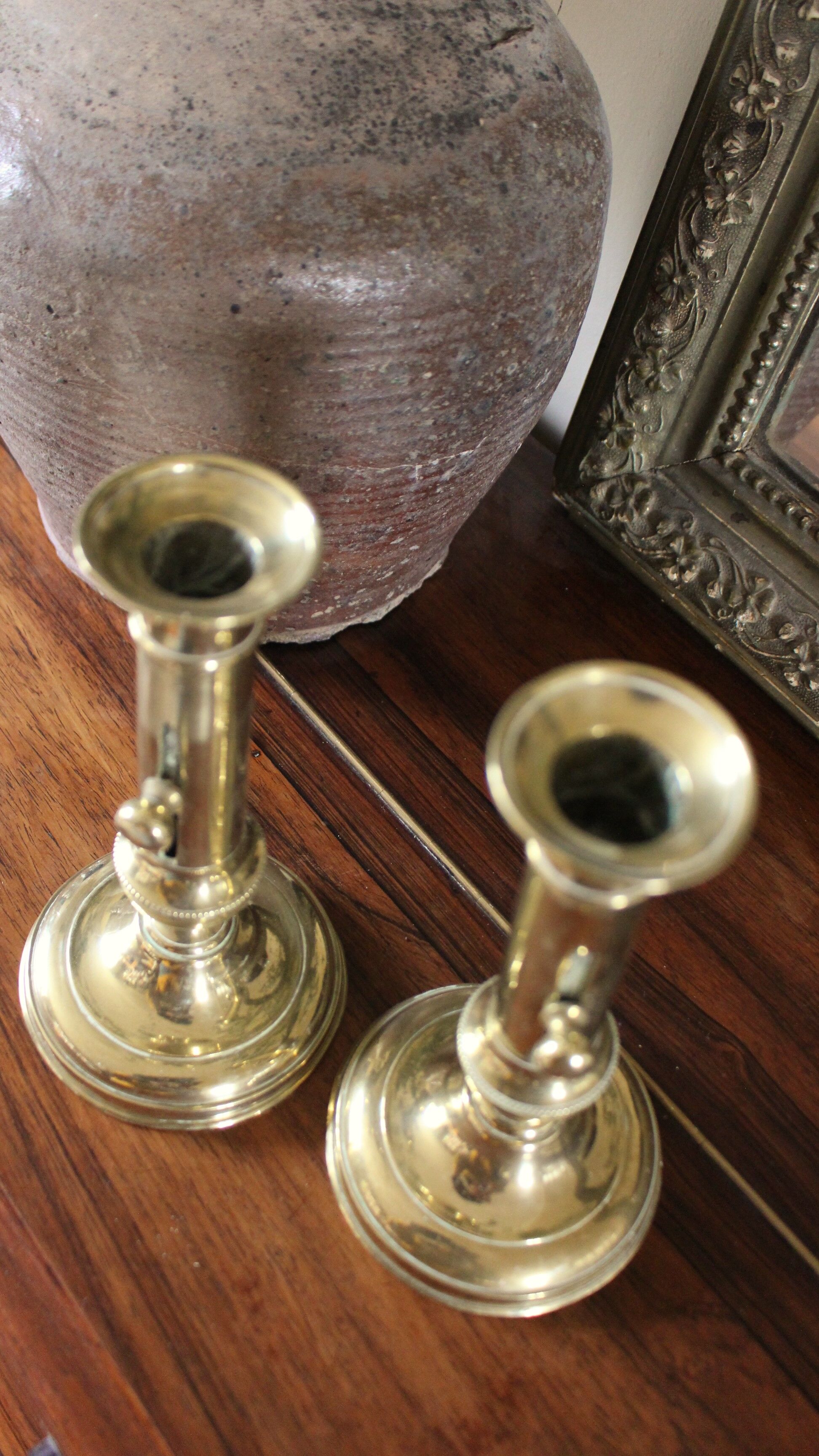 Pair brass candle holders with pusher
