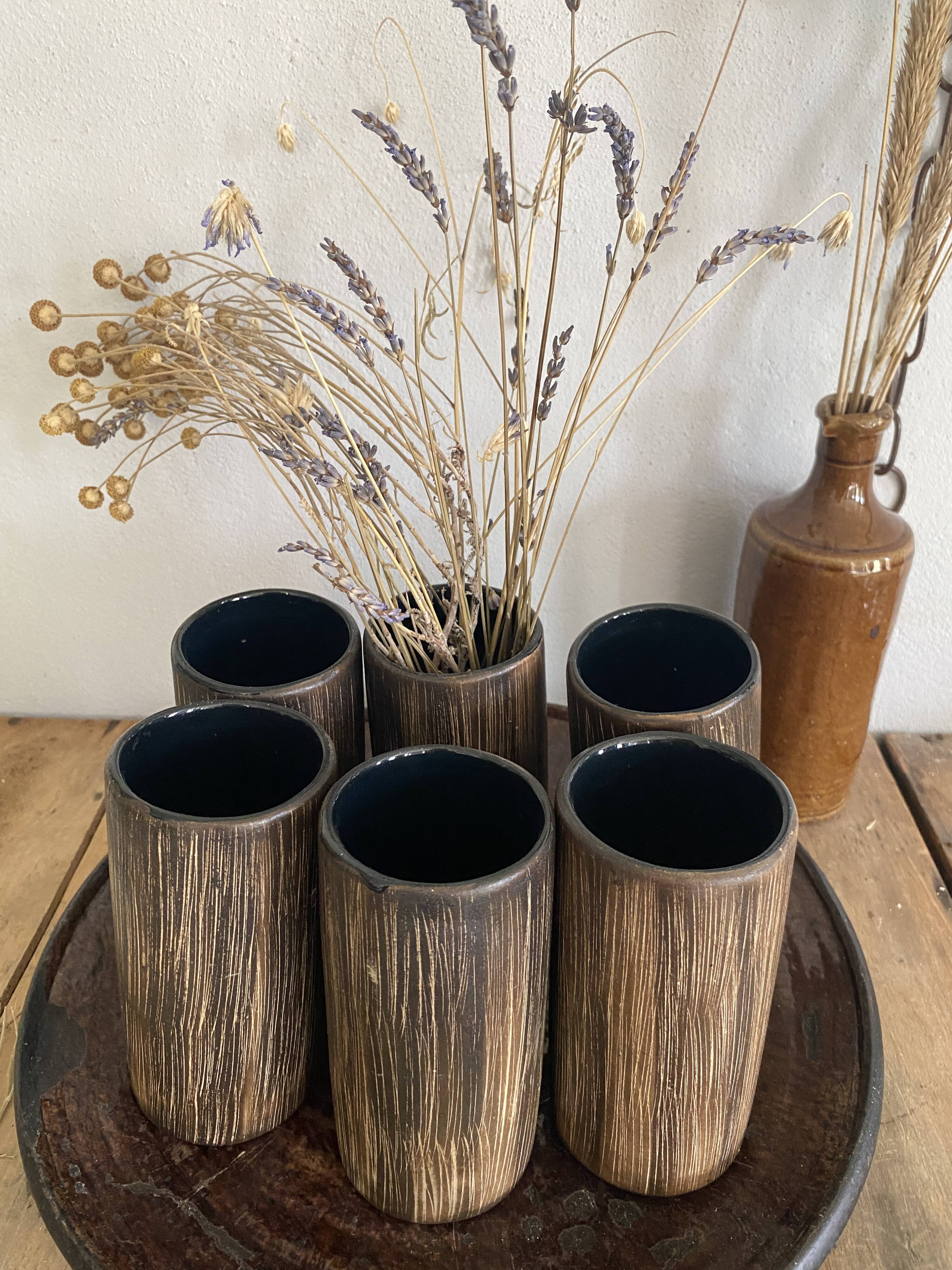 Six terracotta glasses, matt and glazed