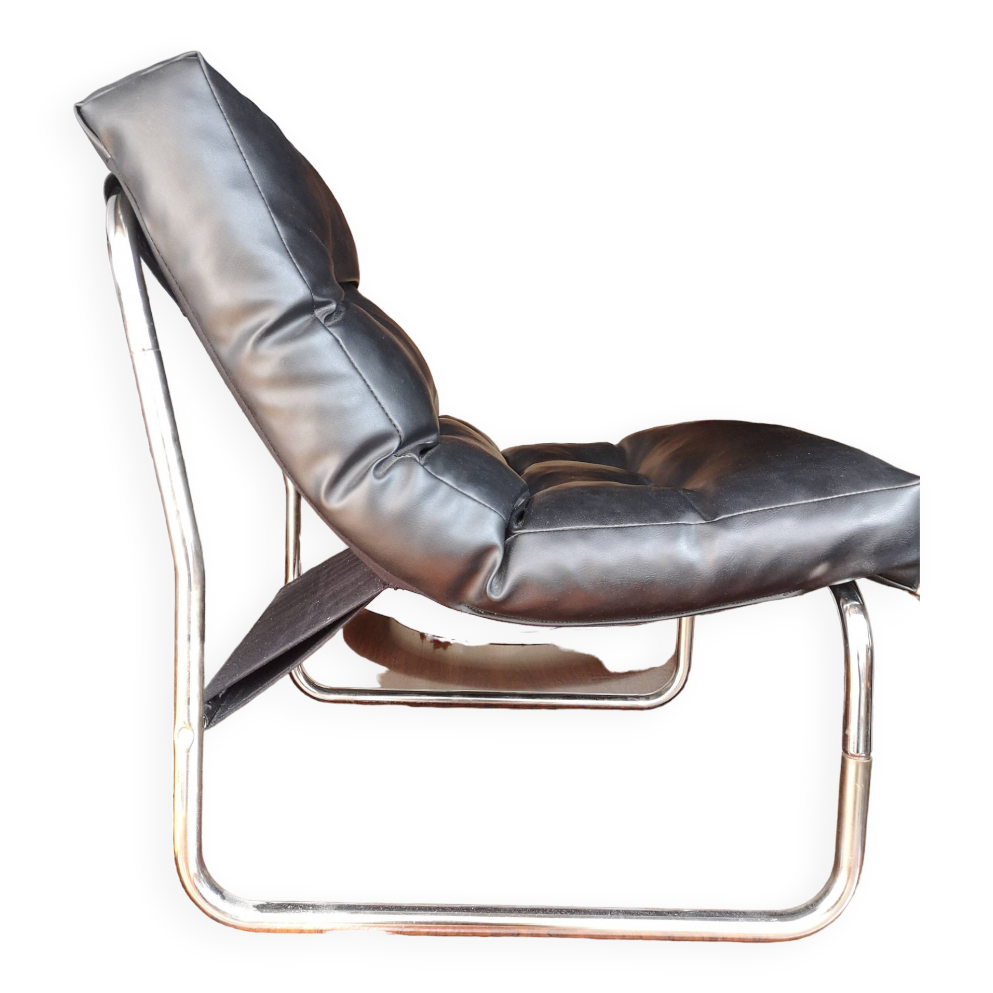 Tubular fireside chair in black skai and metal, design 1970