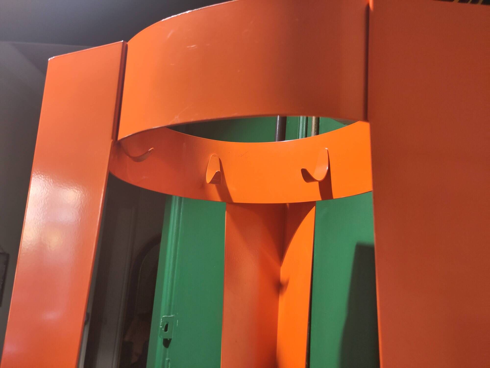 Orange designer coat rack 'Chase G' by Van Esch from the 2000s.